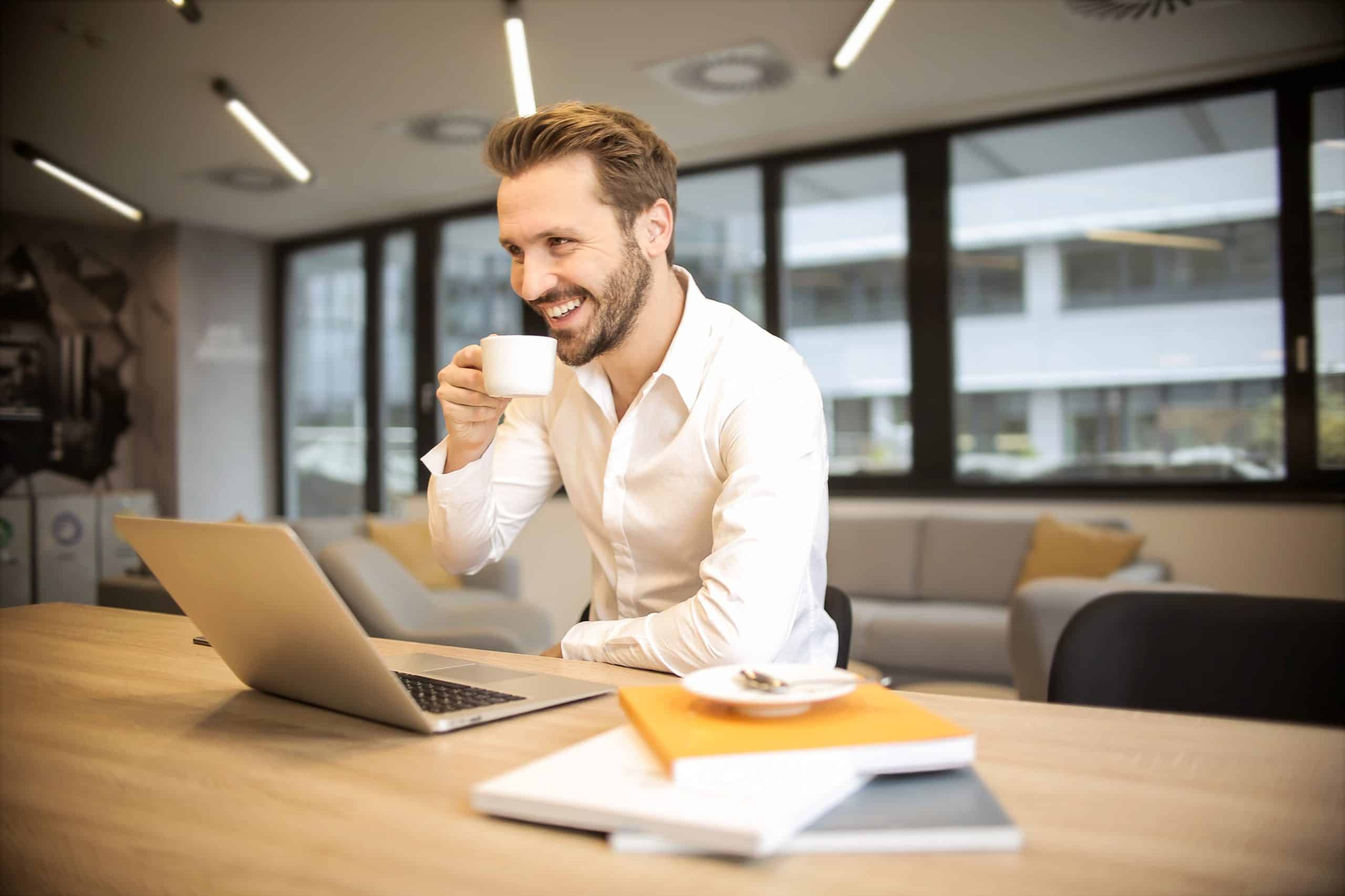 Happy women using laptop