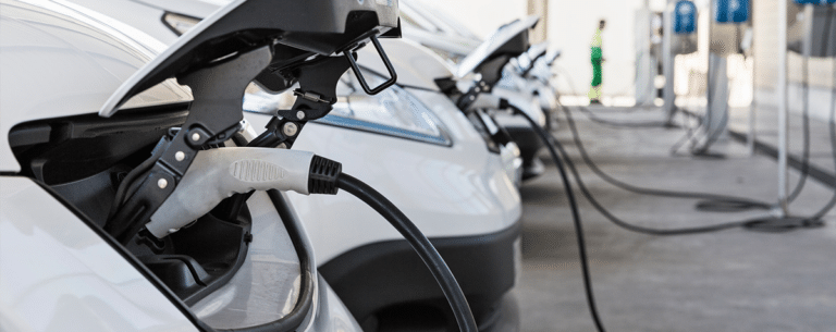A fleet of electric vehicles are charging